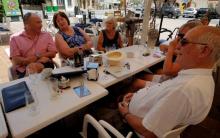 British residents discuss in a restaurant after Britain voted to leave the European Union in the EU Brexit referendum, in Javea near Alicante, Spain, June 24, 2016. PHOTO BY REUTERS/Heino Kalis
