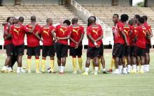 Members of Cameroon's national soccer team listen to their coach Paul Le Guen before during a training session at the Kasarani stadium in Kenya's capital Nairobi