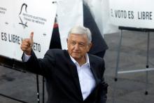 Presidential candidate Andres Manuel Lopez Obrador gestures after casting his ballot at a polling station during the presidential election in Mexico City, Mexico, July 1, 2018. PHOTO BY REUTERS/Carlos Jasso