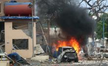 A vehicle burns at the scene of a suicide bomb attack outside Nasahablood hotel in Somalia's capital Mogadishu, June 25, 2016. PHOTO BY REUTERS/Feisal Omar