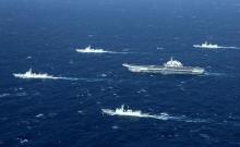 China's Liaoning aircraft carrier with accompanying fleet conducts a drill in an area of South China Sea in this undated photo taken December, 2016. PHOTO BY REUTERS/Stringer