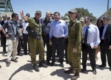 U.S. Secretary of Defense Ash Carter (front 3rd L), Israel's Defence Minister Moshe Ya'alon (front 2nd L), Israeli Brigadier General Moni Katz (front L) and Deputy Chief of Staff Major General Yair Golan stand at the Hussein Lookout near Kiryat Shmona, Israel's border with Lebanon, July 20, 2015. PHOTO BY REUTERS/Carolyn Kaster