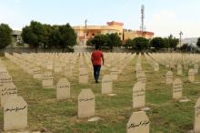 An Iraqi Kurdish resident visits the cemetery for victims of the 1988 chemical attack in the Kurdish town of Halabja, Iraq, September 22, 2017. PHOTO BY REUTERS/Thaier Al-Sudani