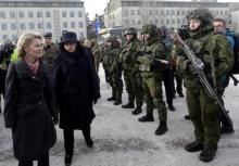 German Defence Minister Ursula von der Leyen (L) and Lithuania's President Dalia Grybauskaite attend a ceremony to welcome the German battalion being deployed to Lithuania as part of NATO deterrence measures against Russia in Rukla, Lithuania, February 7, 2017. PHOTO BY REUTERS/Ints Kalnins