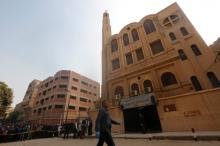 Policemen inspect the site of attack on Mar Mina church in Helwan district on the outskirts of Cairo, Egypt, December 29, 2017. PHOTO BY REUTERS/Amr Abdallah Dalsh
