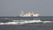China Coast Guard vessels are pictured at the disputed Scarborough Shoal, April 5, 2017. PHOTO BY REUTERS/Erik De Castro