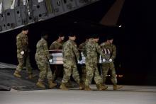 A U.S. Army carry team transfers the remains of Army Staff Sgt. Dustin Wright of Lyons, Georgia, at Dover Air Force Base in Delaware, U.S. on October 5, 2017. PHOTO BY REUTERS/Courtesy Aaron J. Jenne/U.S. Air Force