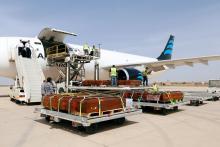 Coffins containing the remains of the bodies of Egyptian Copts killed by Islamic State militants in Sirte are carried by the plane to be transferred to Egypt, in Misrata, Libya, May 14, 2018. PHOTO BY REUTERS/Ismail Zitouny