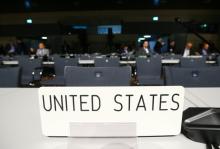 Empty seats of U.S. delegation are seen before the opening session of the COP23 UN Climate Change Conference 2017, hosted by Fiji but held in Bonn, in World Conference Center Bonn, Germany, November 6, 2017. PHOTO BY REUTERS/Wolfgang Rattay
