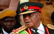 Commander of Zimbabwe Defence Forces General Constantino Chiwenga looks on after the swearing in of Emmerson Mnangagwa as Zimbabwe's new president in Harare, Zimbabwe, November 24, 2017. PHOTO BY REUTERS/Siphiwe Sibeko