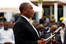 Retired Commander of Zimbabwe Defence Forces (ZDF) General Constatino Chiwenga takes an oath of office as Vice President during the swearing in ceremony at State House in Harare, Zimbabwe, December 28, 2017. PHOTO BY REUTERS/Philimon Bulawayo