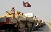 A convoy of Iraqi security forces advances on the outskirts of Mosul, to fight against Islamic State militants, in Kirkuk, Iraq, October 12, 2016. PHOTO BY REUTERS/Ako Rasheed