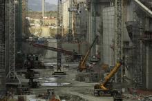 Idle cranes are seen during a tour organized by the Panama Canal authorities of the Panama Canal Expansion project construction site on the Pacific side in Panama City