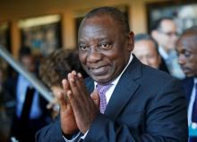 South African Deputy President Cyril Ramaphosa greets security personal at the World Economic Forum on Africa 2017 meeting in Durban, South Africa, May 5, 2017. PHOTO BY REUTERS/Rogan Ward