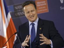 British Prime Minister David Cameron speaks during a news conference at the PGE National Stadium, the venue of NATO summit, in Warsaw, Poland, July 9, 2016. PHOTO BY REUTERS/Kacper Pempel