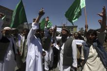 Afghan demonstrators shout slogans in support of presidential candidate Abdullah Abdullah in Kabul