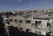 A general view of the destruction after what activists said were at least 20 air strikes by forces loyal to Syria's President Bashar al-Assad in the Douma neighbourhood of Damascus, February 5, 2015. PHOTO BY REUTERS/ Mohammed Badra
