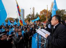 Dolkun Isa, President of the World Uyghur Congress, speaks during a demonstration against China during its Universal Periodic Review by the Human Rights Council in front of the United Nations Office in Geneva, Switzerland, November 6, 2018. PHOTO BY REUTERS/Denis Balibouse