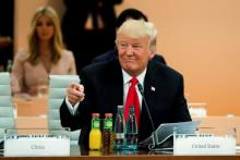 U.S. President Donald Trump attends a working session at the G-20 summit in Hamburg, northern Germany, Saturday, July 8, 2017. PHOTO BY REUTERS/Markus Schreiber
