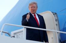 U.S. President Donald Trump boards Air Force One for travel to Hawaii, on his way to an extended trip to five countries in Asia, from Joint Base Andrews, Maryland, U.S., November 3, 2017. PHOTO BY REUTERS/Jonathan Ernst