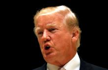 U.S. President Donald Trump speaks upon arrival for dinner at his golf club in West Palm Beach, Florida, U.S., January 14, 2018. PHOTO BY REUTERS/Kevin Lamarque