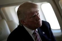 Republican presidential nominee Donald Trump speaks to reporters aboard his plane as he travels between campaign stops in Ohio, U.S., September 5, 2016. PHOTO BY REUTERS/Mike Segar