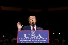 U.S. President-elect Donald Trump speaks at a USA Thank You Tour event at Crown Coliseum in Fayetteville, North Carolina, U.S., December 6, 2016. PHOTO BY REUTERS/Shannon Stapleton