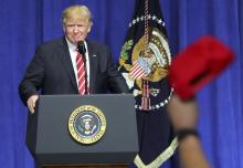 U.S. President Donald Trump is welcomed as he speaks to commanders and coalition representatives during a visit to U.S. Central Command and U.S. Special Operations Command at MacDill Air Force Base in Tampa, Florida, U.S., February 6, 2017. PHOTO BY REUTERS/Carlos Barria