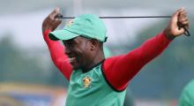 Zimbabwe's Elton Chigumbura stretches during a practice session ahead of their first ICC World Twenty20 cricket match against Sri Lanka in Hambantota, September 17, 2012. PHOTO BY REUTERS/Dinuka Liyanawatte