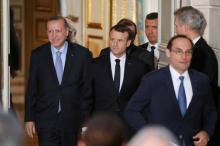 French President Emmanuel Macron (R) and Turkish President Recep Tayyip Erdogan (L) arrive for a joint press conference at the Elysee Palace in Paris, France, January 5, 2018. PHOTO BY REUTERS/Ludovic Marin
