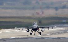 A Turkish Air Force F-16 fighter jet lands at Incirlik air base in Adana, Turkey, August 11, 2015. PHOTO BY REUTERS/Murad Sezer