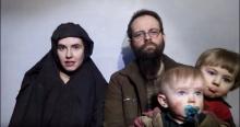 A still image from a video posted by the Taliban on social media on December 19, 2016 shows American Caitlan Coleman (L) speaking next to her Canadian husband Joshua Boyle and their two sons. PHOTO BY REUTERS/Courtesy Taliban/Social media