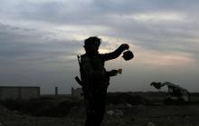 A Free Syrian army fighter pours tea in the rebel-held town of Dael, Syria, December 22, 2017. PHOTO BY REUTERS/Alaa Al-Faqir