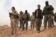 Syrian Democratic Forces (SDF) fighters gather during an offensive against Islamic State militants in northern Raqqa province, Syria, February 8, 2017. PHOTO BY REUTERS/Rodi Said
