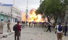 A still from a Reuters TV video shows a secondary explosion after a suspected suicide car bomb rammed into the gates of a hotel in Mogadishu, Somalia. PHOTO BY REUTERS