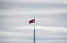 A North Korean flag flutters on top of a 160-metre tower in North Korea's propaganda village of Gijungdong, in this picture taken from the Tae Sung freedom village near the Military Demarcation Line (MDL), inside the demilitarised zone separating the two Koreas, in Paju, South Korea, April 24, 2018. PHOTO BY REUTERS/Kim Hong-Ji