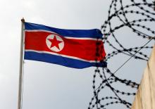 The North Korea flag flutters next to concertina wire at the North Korean embassy in Kuala Lumpur, Malaysia, March 9, 2017. PHOTO BY REUTERS/Edgar Su