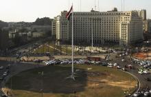 Egypt's national flag is seen raised at the top of a flagpole, which was recently installed in Tahrir square, in central Cairo, February 8, 2015. PHOTO BY REUTERS/Asmaa Waguih