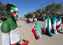 A man with body paint in the colours of the national flag participates in a street parade to celebrate the 24th self-declared independence day for the breakaway Somaliland nation from Somalia in capital Hargeysa, May 18, 2015. PHOTO BY REUTERS/Feisal Omar