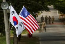 The South Korean and American flags fly next to each other at Yongin, South Korea, August 23, 2016. PHOTO BY REUTERS/Ken Scar/U.S. Army