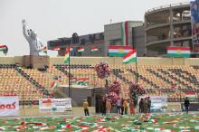 People carry the flags of Kurdistan before the start of a rally calling to vote yes in the coming referendum, in Erbil, Iraq, September 22, 2017. PHOTO BY REUTERS/Azad Lashkari
