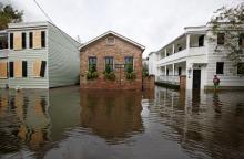Flood waters rise up to homes in an affluent historic neighborhood after Hurricane Matthew hit Charleston, South Carolina. PHOTO BY REUTERS/Jonathan Drake