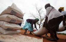 Villagers collect their monthly food ration provided by the United Nations World Food Programme (WFP) in Masvingo, Zimbabwe, January 25, 2016. PHOTO BY REUTERS/Philimon Bulawayo