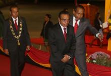 President of East Timor Francisco Guterres Lu'Olo (C) is accompanied by the Parliament Speaker Aderito Hugo da Costa (R) as the outgoing President Jose Maria Vasconcelos walks behind during presidential inauguration ceremony in Dili, East Timor, May 20, 2017. PHOTO BY REUTERS/Lirio Da Fonseca