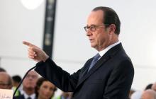 France's President Francois Hollande gestures as he speaks during a visit to Louvre Abu Dhabi, in Abu Dhabi, United Arab Emirates, December 3, 2016. PHOTO BY REUTERS/Stringer