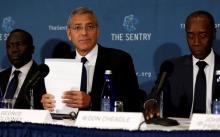 George Clooney (C), with fellow actor Don Cheadle (R) and The Sentry investigative journalist Brian Adeba (L), discuss The Sentry's investigation of the role of national corruption in the ongoing humanitarian crisis in South Sudan during a news conference at the National Press Club in Washington, U.S., September 12, 2016. PHOTO BY REUTERS/Jonathan Ernst