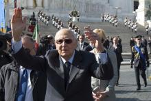 Italy's President Giorgio Napolitano waves during a Liberation Day ceremony at the Unknown Soldier's monument in central Rome, April 25, 2014. PHOTO BY REUTERS/Paolo Giandotti/Italian Presidency Press Office
