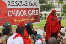A member of the #BringBackOurGirls Abuja campaign group addresses a sit-in protest at the Unity Fountain in Abuja, June 18, 2014. PHOTO BY REUTERS/Afolabi Sotunde