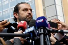 Lebanese Prime Minister-designate Saad al-Hariri speaks to the media in front of the Special Tribunal for Lebanon ahead of the closings arguments in the trial of Lebanon's Rafik al-Hariri alleged killers in the Hague, the Netherlands, September 11, 2018. PHOTO BY REUTERS/Bas Czerwinski