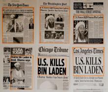 Newspaper headlines and clippings are posted on a wall inside a staff office at the White House in Washington May 2, 2011, the morning after U.S. President Barack Obama announced the death of Osama bin Laden. PHOTO BY REUTERS/Jason Reed